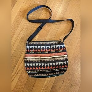 Le Sportsac crossbody bag black orange tan silver gold tribal print euc